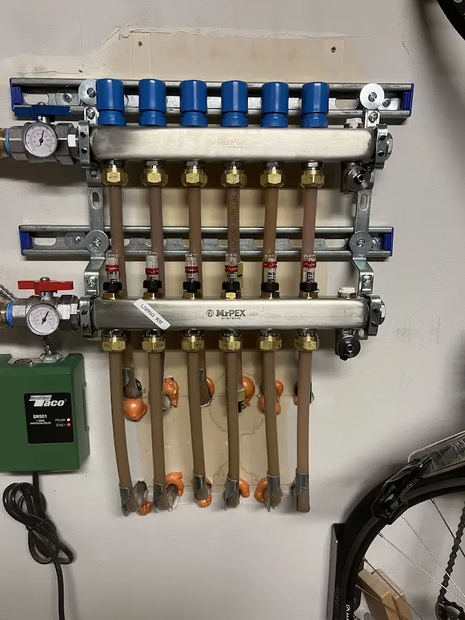 Plumber performing Water Heater Repair at a residential property in Catonsville